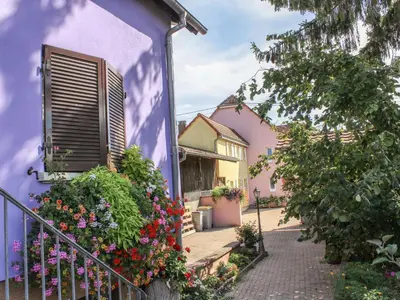 Jardin de l'établissement Apartment Résidence jaune et rose-1 by Interhome