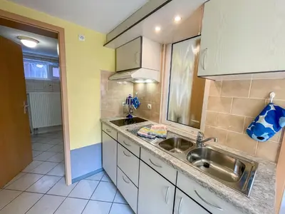 Cuisine ou kitchenette dans l'établissement Apartment Résidence jaune et rose-1 by Interhome