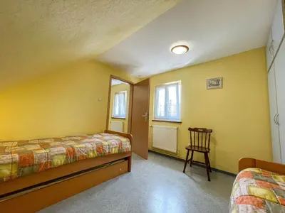 Un ou plusieurs lits dans un hébergement de l'établissement Apartment Résidence jaune et rose-4 by Interhome