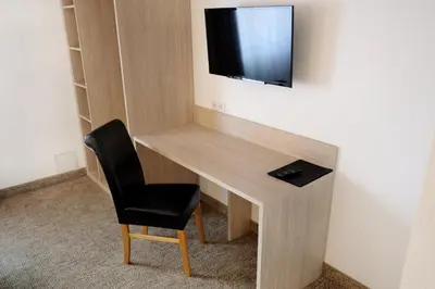 Télévision ou salle de divertissement dans l'établissement Chambres d'hôtes François Bleger