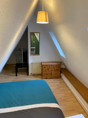 Un ou plusieurs lits dans un hébergement de l'établissement Appartement Duplex 2a Rue d'Alspach