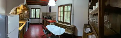 Cuisine ou kitchenette dans l'établissement CHALET DE MANU