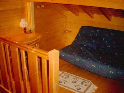 Un ou plusieurs lits dans un hébergement de l'établissement Chalet Helalph