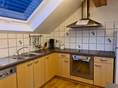 Cuisine ou kitchenette dans l'établissement Gite des Merles