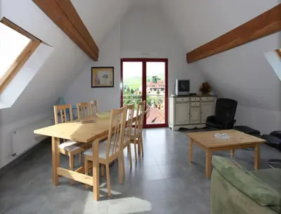 Coin salon dans l'établissement La maison du Vignoble