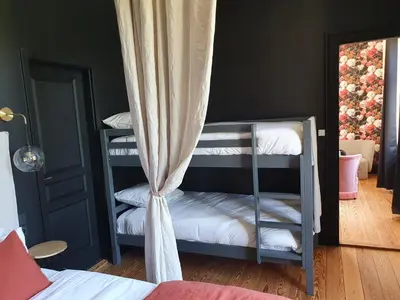 Un ou plusieurs lits dans un hébergement de l'établissement Sojolidays - Appartements d'hôtes sur la Route des Vins d'Alsace