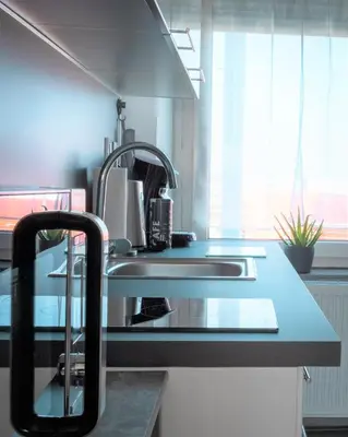 Cuisine ou kitchenette dans l'établissement Comfort Stay Basel Airport 2A46