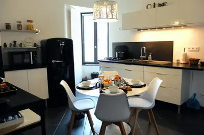 Cuisine ou kitchenette dans l'établissement Chez Thomas