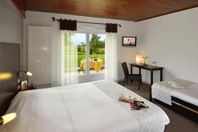 Un ou plusieurs lits dans un hébergement de l'établissement Hôtel du Bollenberg - Restaurant 