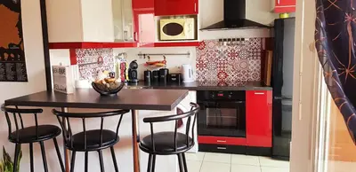 Cuisine ou kitchenette dans l'établissement Chez Damien