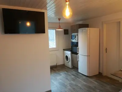 Cuisine ou kitchenette dans l'établissement The Primevères Home - SPA