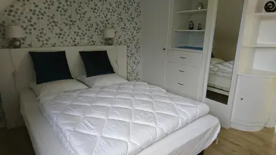 Un ou plusieurs lits dans un hébergement de l'établissement La maison de Paul