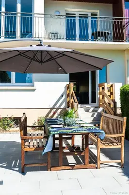 Balcon ou terrasse dans l'établissement Le jardin idyllique - sauna - vue lac