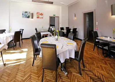 Restaurant ou autre lieu de restauration dans l'établissement Hôtel Restaurant Au Coucou