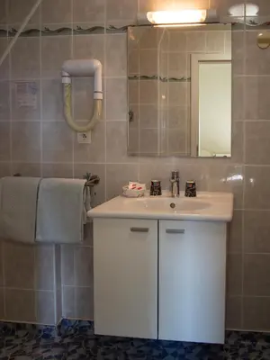 Salle de bains dans l'établissement Hôtel Restaurant Au Coucou