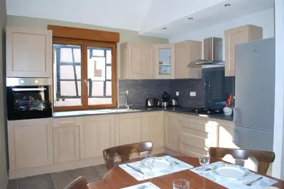 Cuisine ou kitchenette dans l'établissement LE LOFT