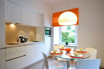 Cuisine ou kitchenette dans l'établissement Le Duplex de Jules