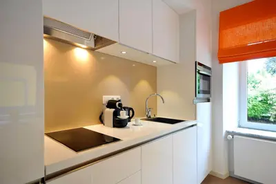 Cuisine ou kitchenette dans l'établissement Le Duplex de Jules