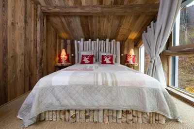Un ou plusieurs lits dans un hébergement de l'établissement Chalet Le Lodge
