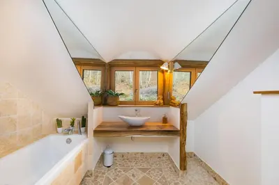 Un ou plusieurs lits dans un hébergement de l'établissement Chalet Le Lodge