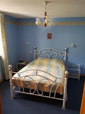 Un ou plusieurs lits dans un hébergement de l'établissement La Maison Jaune