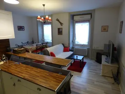 Télévision ou salle de divertissement dans l'établissement Le Cosy