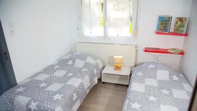 Un ou plusieurs lits dans un hébergement de l'établissement Gîte du sabotier