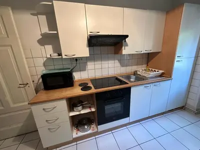 Cuisine ou kitchenette dans l'établissement Le Cocon - 3 pièces Mulhouse Gare/Centre