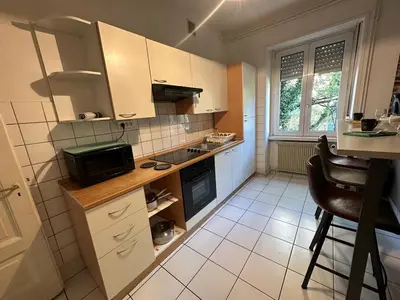 Cuisine ou kitchenette dans l'établissement Le Cocon - 3 pièces Mulhouse Gare/Centre