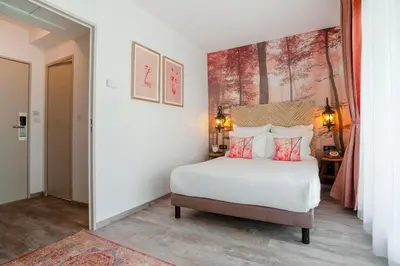 Un ou plusieurs lits dans un hébergement de l'établissement La Maison Hôtel Mulhouse Centre