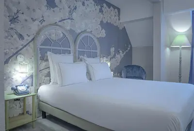 Un ou plusieurs lits dans un hébergement de l'établissement La Maison Hôtel Mulhouse Centre