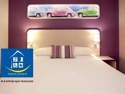 Un ou plusieurs lits dans un hébergement de l'établissement ibis Styles Montbéliard