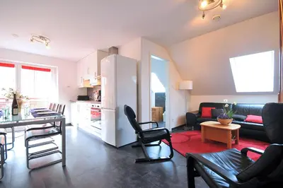 Coin salon dans l'établissement Gites Chez Schangala