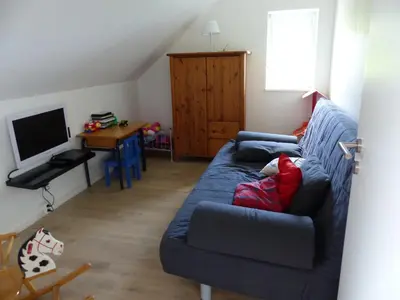 Télévision ou salle de divertissement dans l'établissement Gites Chez Schangala