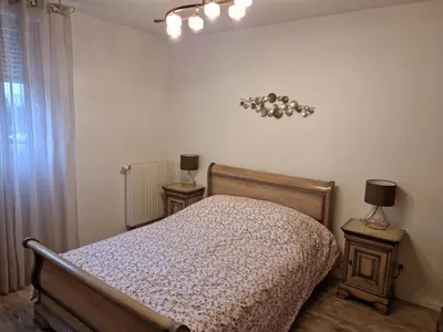 Un ou plusieurs lits dans un hébergement de l'établissement Résidence Villa d'Ambre