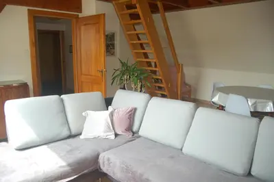 Coin salon dans l'établissement Le gîte à l'ombre du tilleul