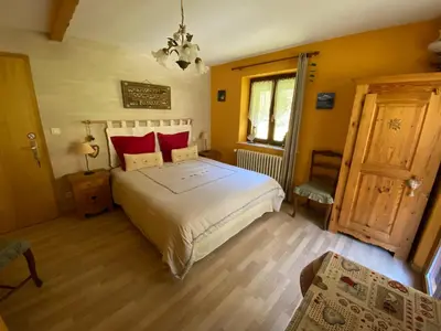 Un ou plusieurs lits dans un hébergement de l'établissement Chambres d'Hôtes des Cascades St-Nicolas