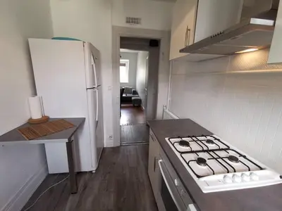 Cuisine ou kitchenette dans l'établissement 6 personnes, neuf & cosy, centre - gare