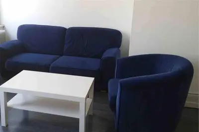 Coin salon dans l'établissement F3 lumineux & cosy au centre de Mulhouse