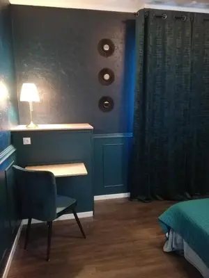 Un ou plusieurs lits dans un hébergement de l'établissement Gîte, le Colmar Vintage Station