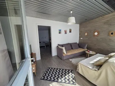 Coin salon dans l'établissement Gite chez LiLi