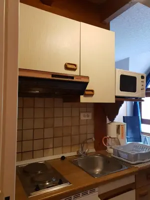 Cuisine ou kitchenette dans l'établissement Studio chez le vigneron