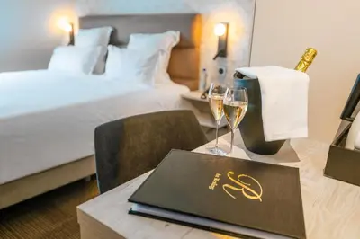 Un ou plusieurs lits dans un hébergement de l'établissement Hotel Restaurant Au Riesling