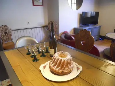 Télévision ou salle de divertissement dans l'établissement Le Winzer