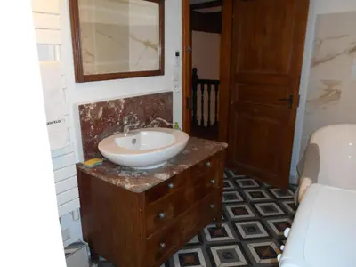 Salle de bains dans l'établissement Le Winzer