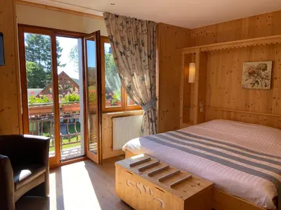 Un ou plusieurs lits dans un hébergement de l'établissement LE CLOS DES SOURCES Hôtel & Spa
