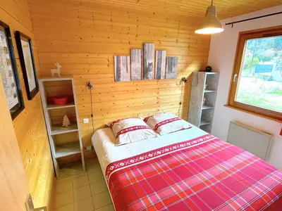 Un ou plusieurs lits dans un hébergement de l'établissement Chalet tout confort 'Le Grand Pré', terrain clôturé, garage