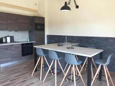 Cuisine ou kitchenette dans l'établissement Le Balcon des Lumières