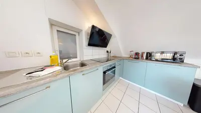 Cuisine ou kitchenette dans l'établissement Duplex des Dominicains - 1 Parking GRATUIT - Hypercentre 6 personnes