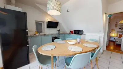 Cuisine ou kitchenette dans l'établissement Duplex des Dominicains - 1 Parking GRATUIT - Hypercentre 6 personnes